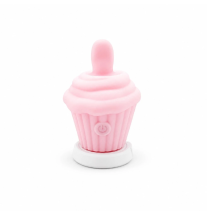 Mini wibrator Sweet Cupcake ustawiony na podstawce ładującej