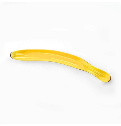 Szklane dildo Banan w żółtym kolorze - zakrzywiony gadżet do stymulacji intymnej.