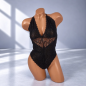 Black Floral Elegance – czarne koronkowe body damskie z głębokim dekoltem i odkrytymi plecami, różne rozmiary Black Floral Elegance – czarne koronkowe body damskie z głębokim dekoltem i odkrytymi plecami, różne rozmiary