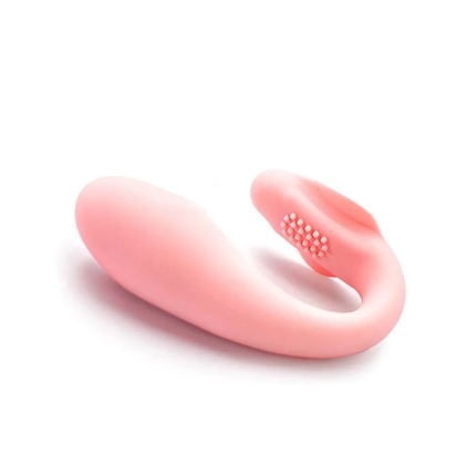 Różowy wibrator typu wearable w kształcie U – widok z boku